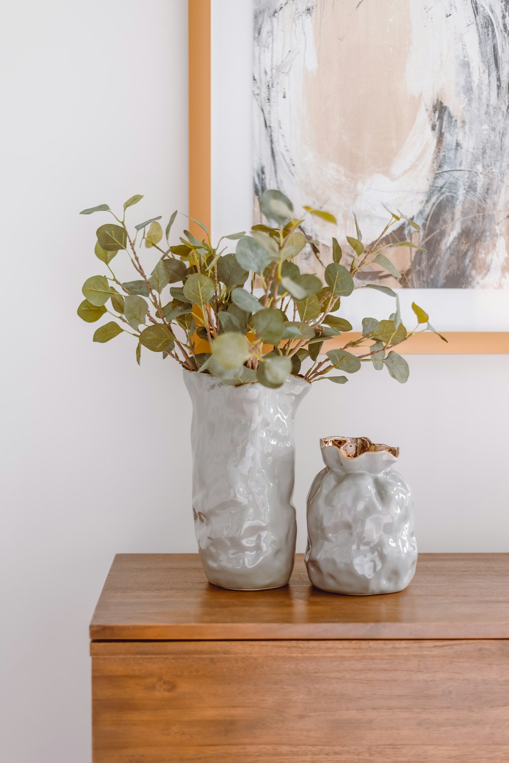 green plant in white ceramic vase