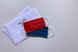 red and blue pouch on white paper