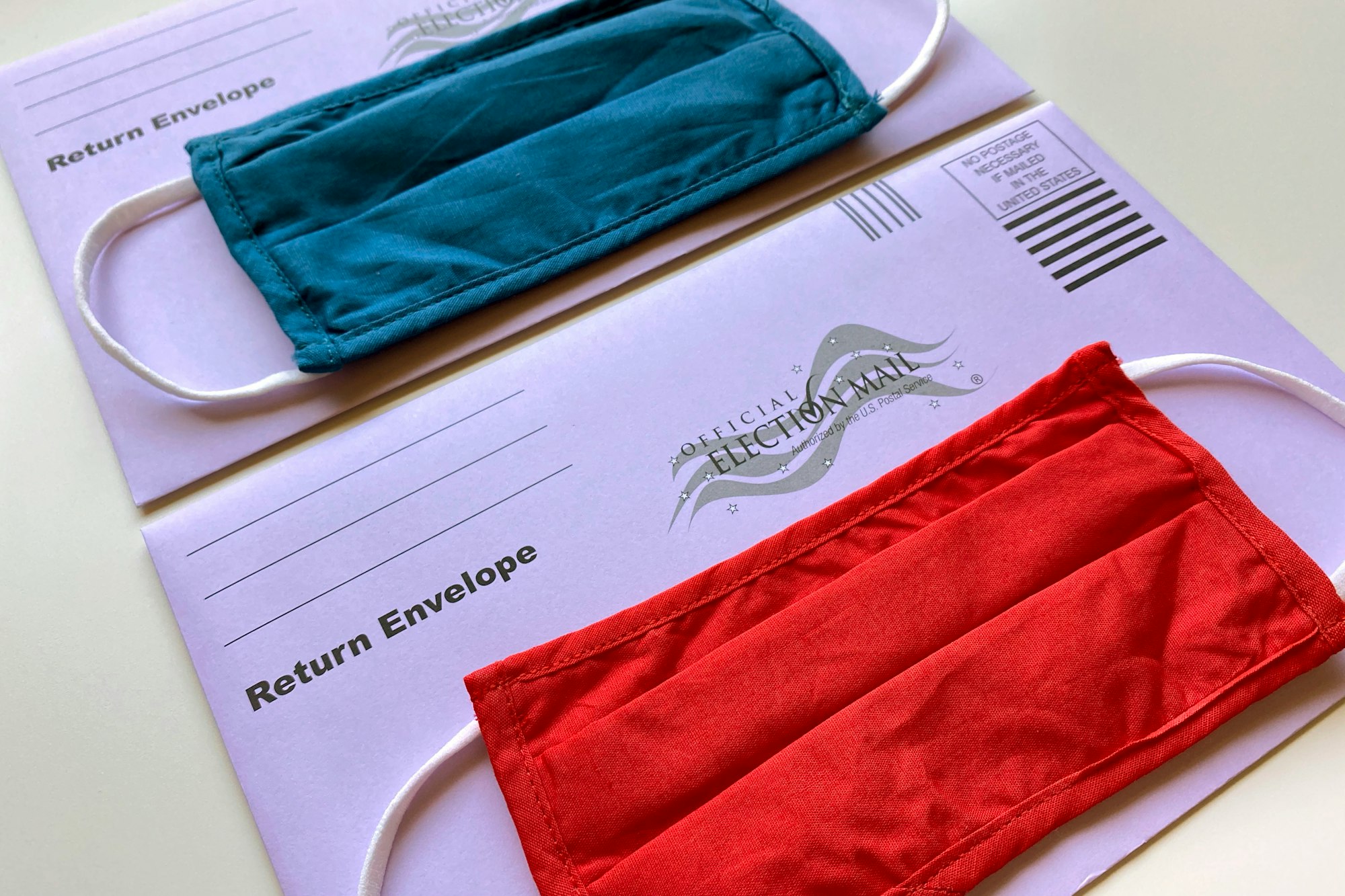 Election mail envelopes with face masks