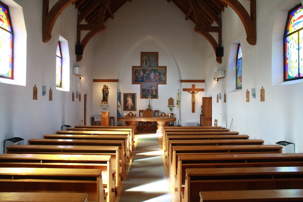 brown wooden church bench inside church