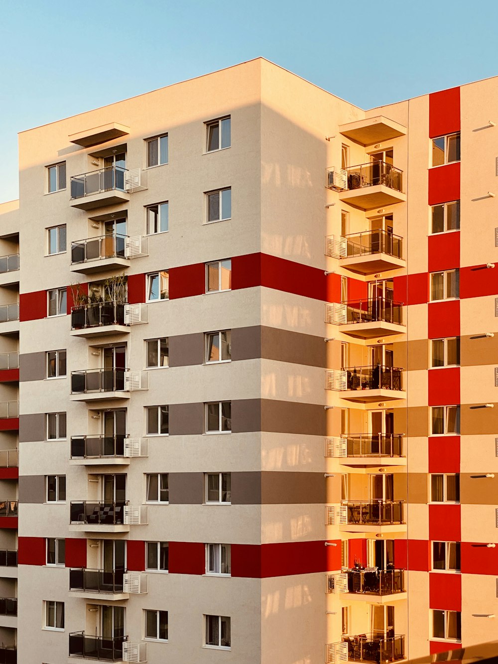 brown and white concrete building during daytime