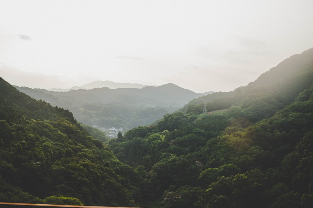 green mountains under white sky during daytime