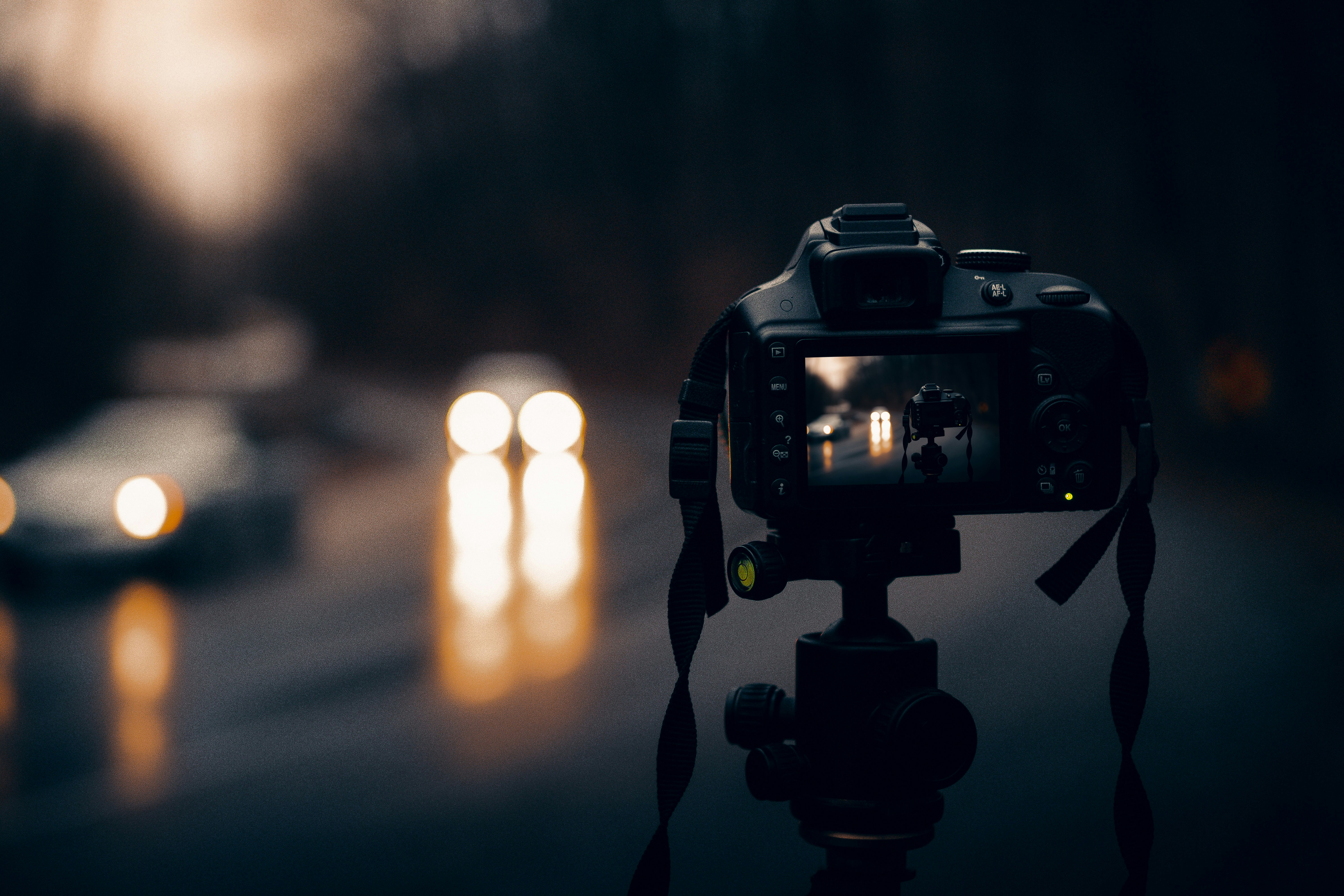 black dslr camera on tripod indiana teams background