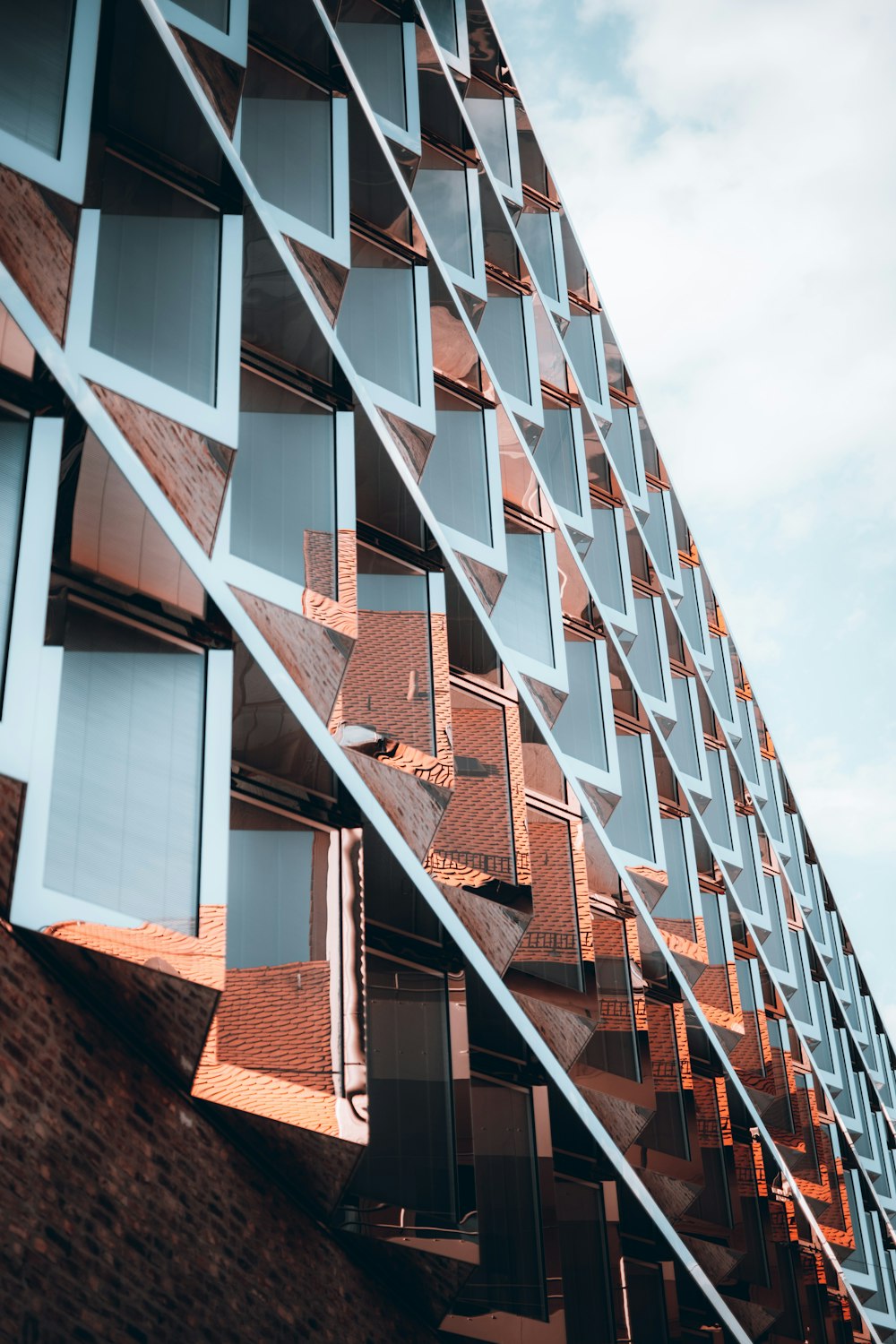 brown and white concrete building during daytime