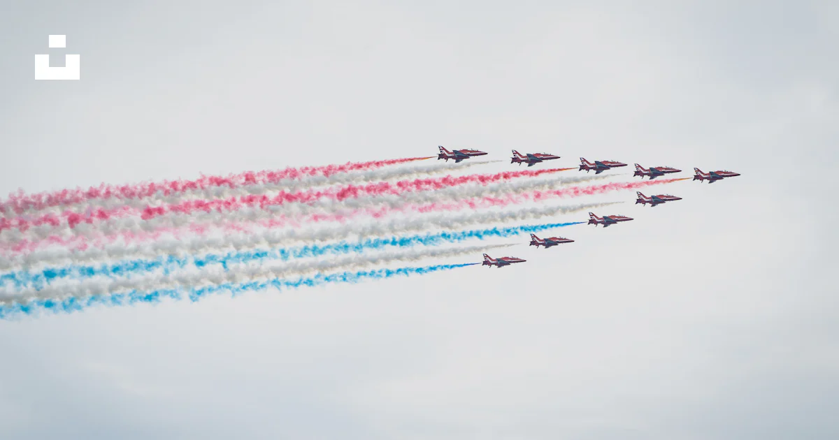 Jet Plane Red White and red jet plane in the sky photo – Free Il Image on Unsplash