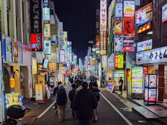 people walking on sidewalk during daytime