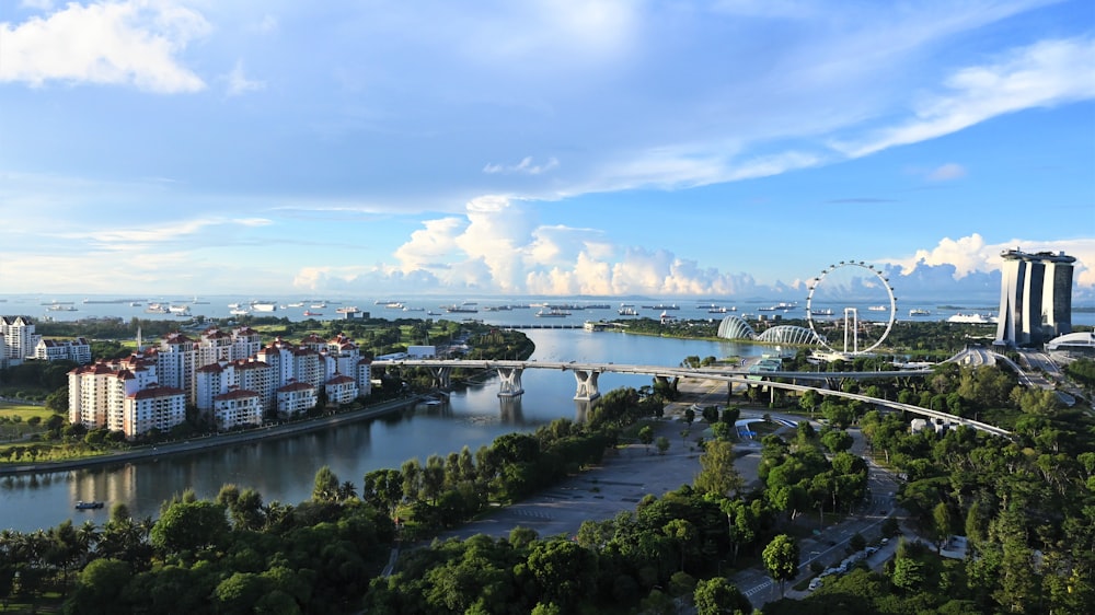 aerial view of city buildings near body of water during daytime