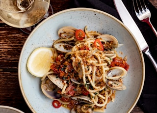 pasta dish on blue ceramic bowl