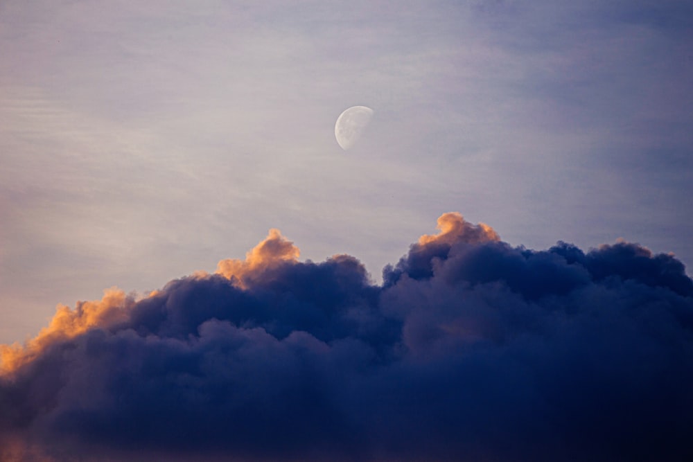 full moon covered by clouds