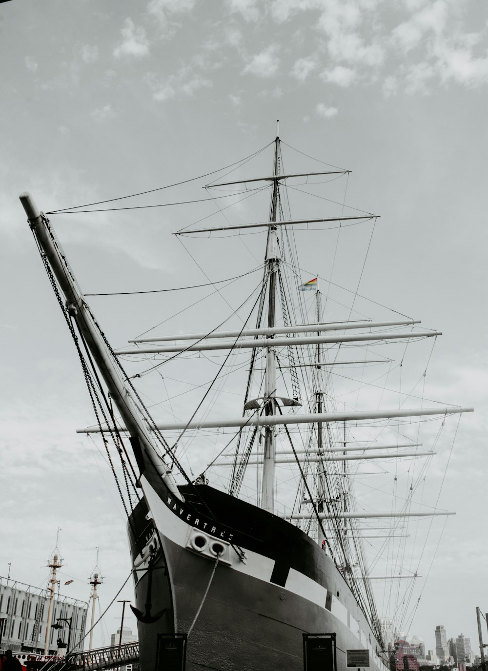 black and white sail ship on sea during daytime