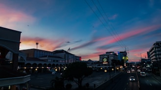 A dynamic cityscape of Washington DC at dusk, highlighting government buildings with a vibrant sky.