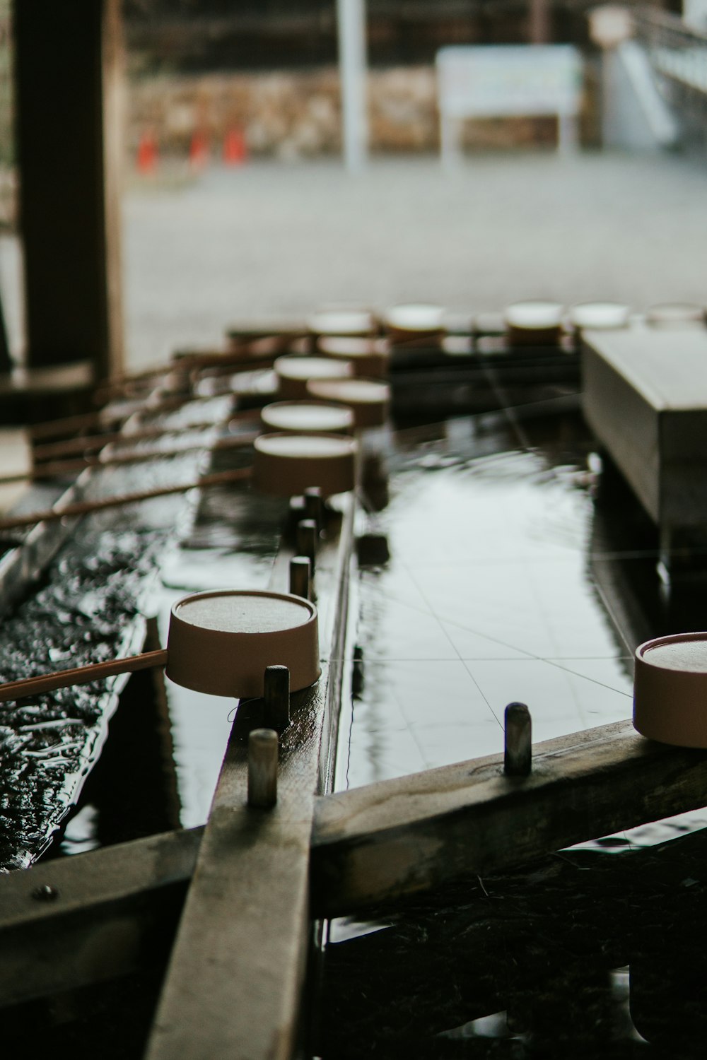 white ceramic mug on brown wooden table