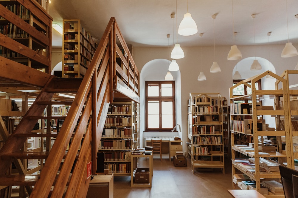 brown wooden book shelves in room