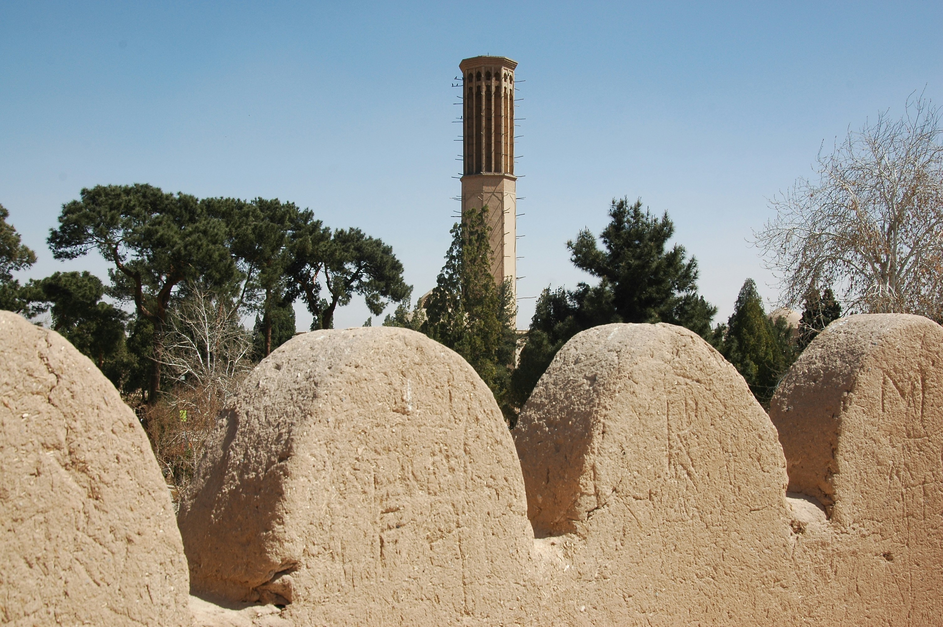 a tall clock tower towering over a city