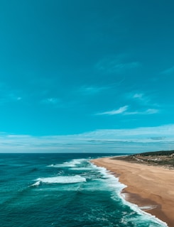 blue sea under blue sky during daytime