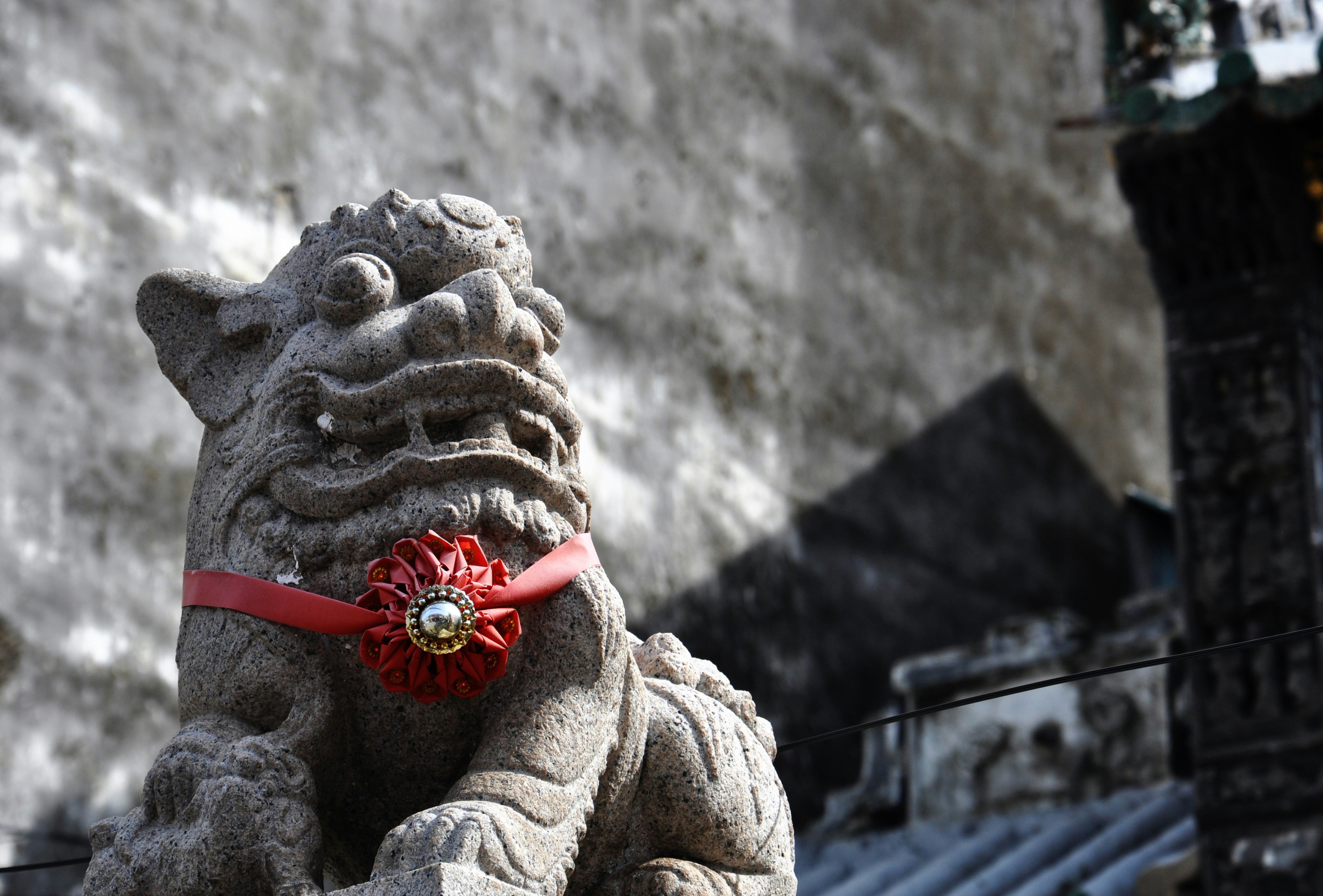 Gray concrete statue with red ribbon photo – Free Penang island Image ...