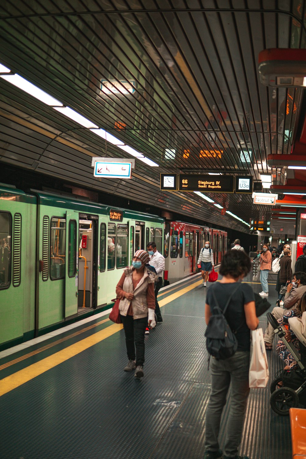 people walking on train station