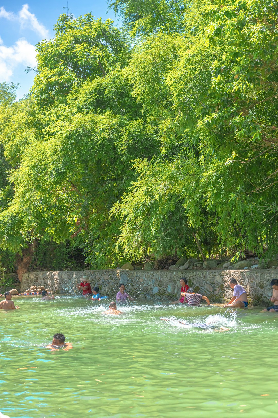 people in body of water during daytime