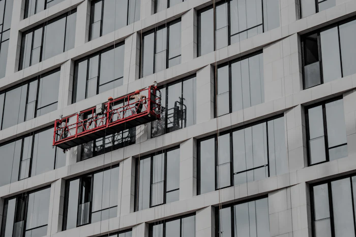 Window washer using a water-fed pole for upper windows