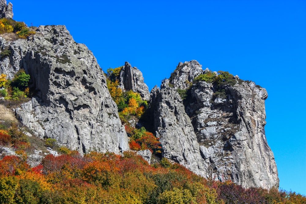 gray rock formation under blue sky during daytime