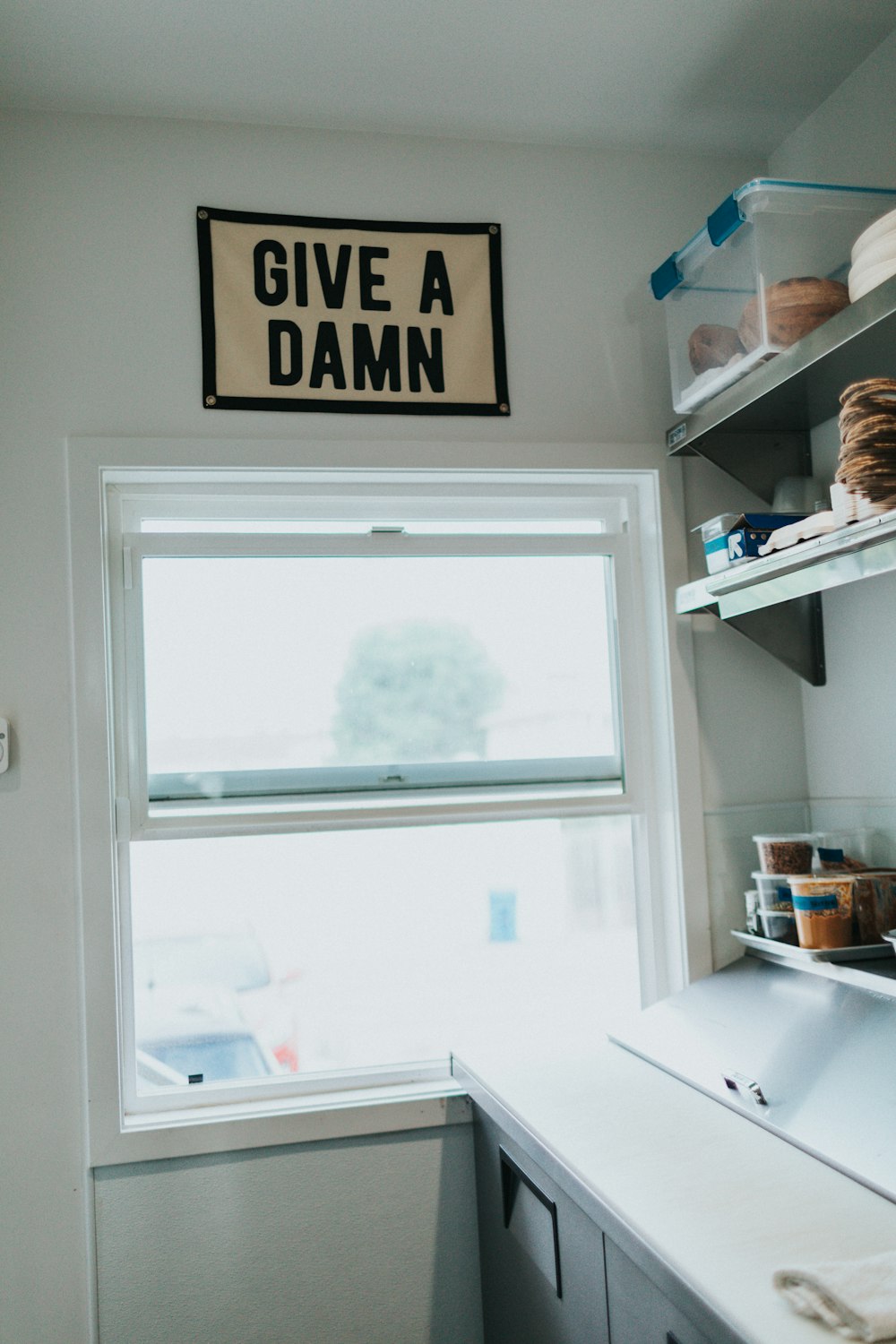 white wooden framed glass window