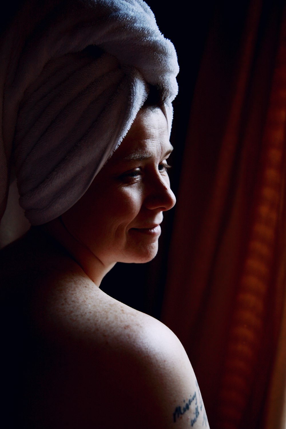 woman in white towel on head