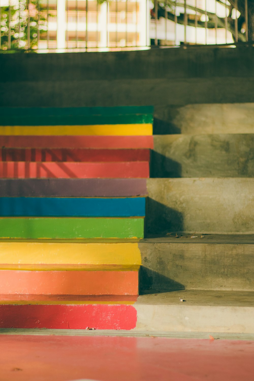 multi colored plastic blocks on brown wooden table