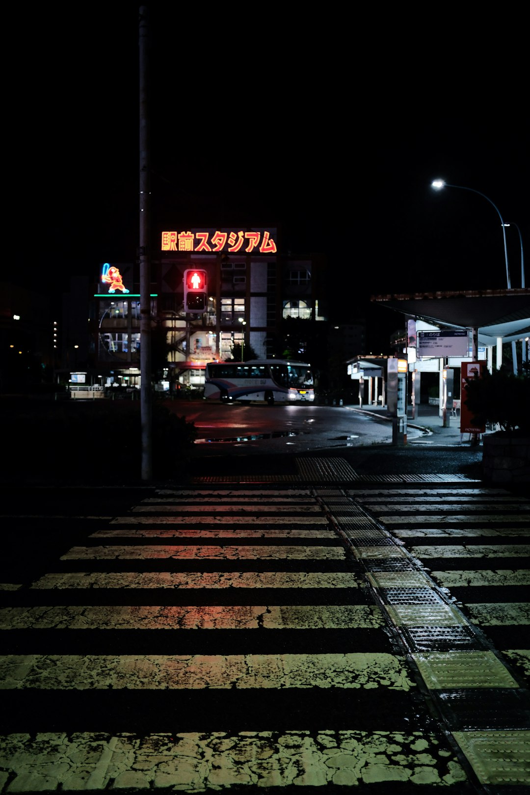 cars parked on sidewalk during night time