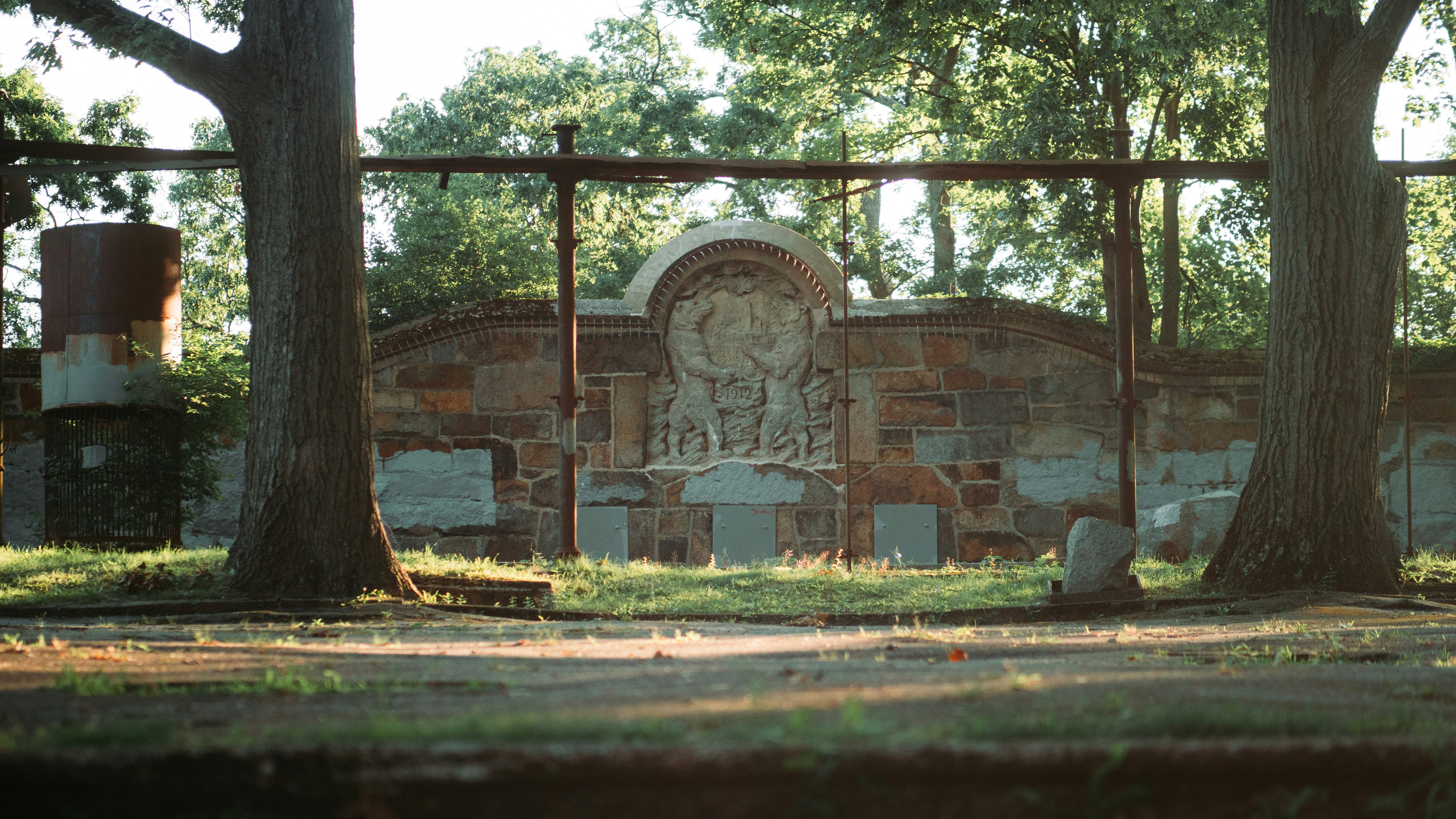 Morning light surrounds the artifacts of the Old Bear Dens in Franklin Park, Boston. 