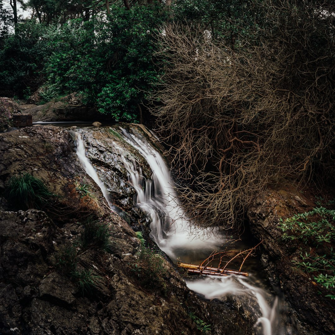 time lapse photography of waterfalls