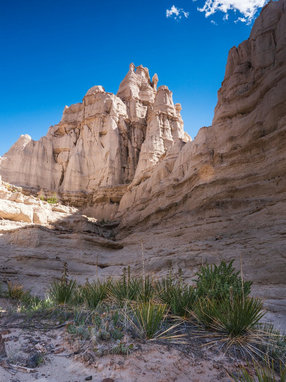 brown rock formation under blue sky during daytime