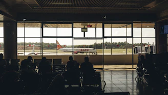 people sitting on black chairs