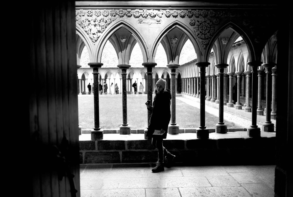 silhouette of man and woman standing on concrete floor