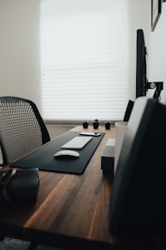 black and white tablet computer on brown wooden table
