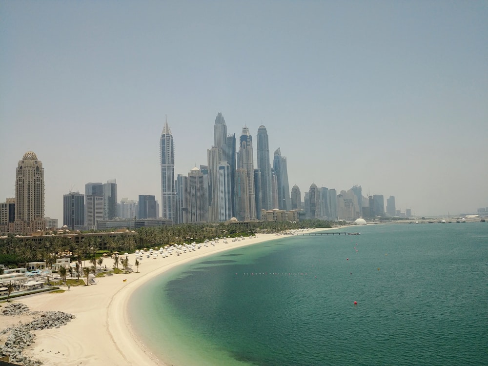 high rise buildings near sea during daytime