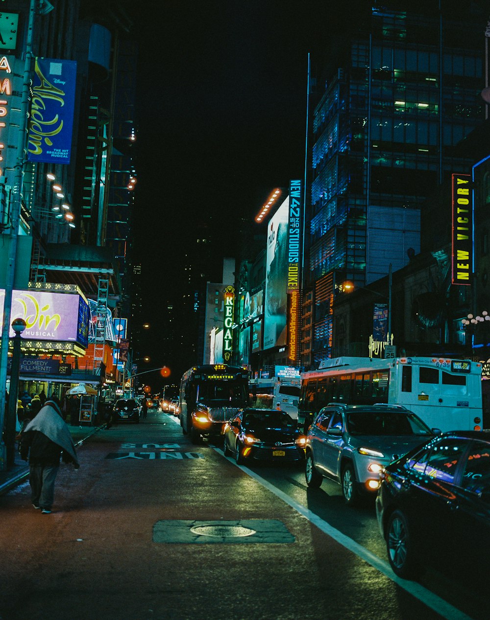 cars on road in city during night time