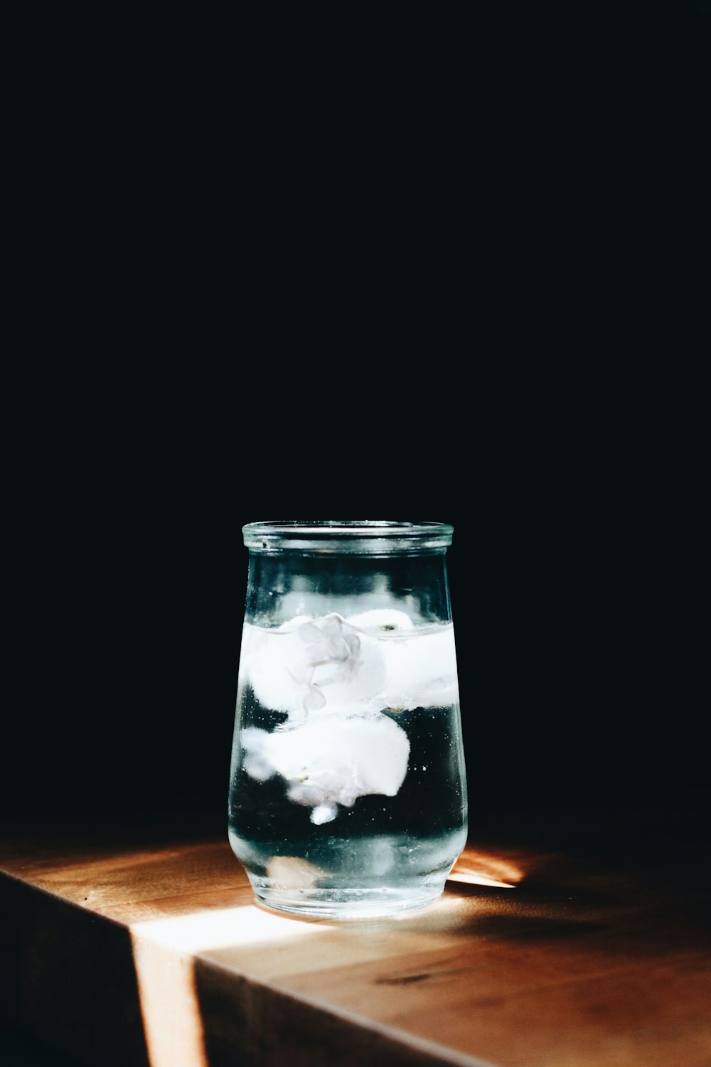 ice in clear glass jar