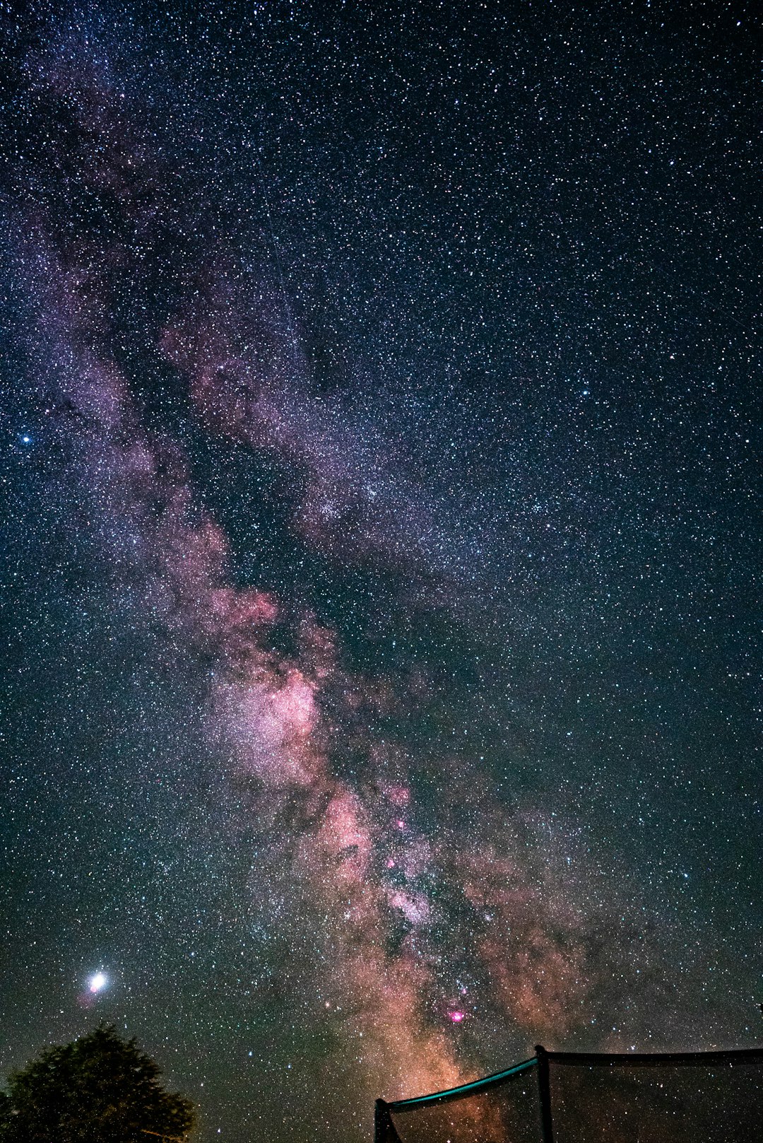 blue and red starry night sky