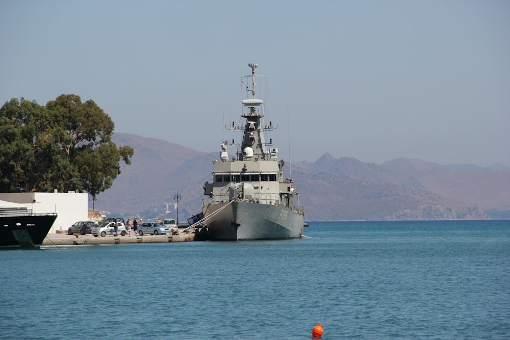 white ship on sea during daytime