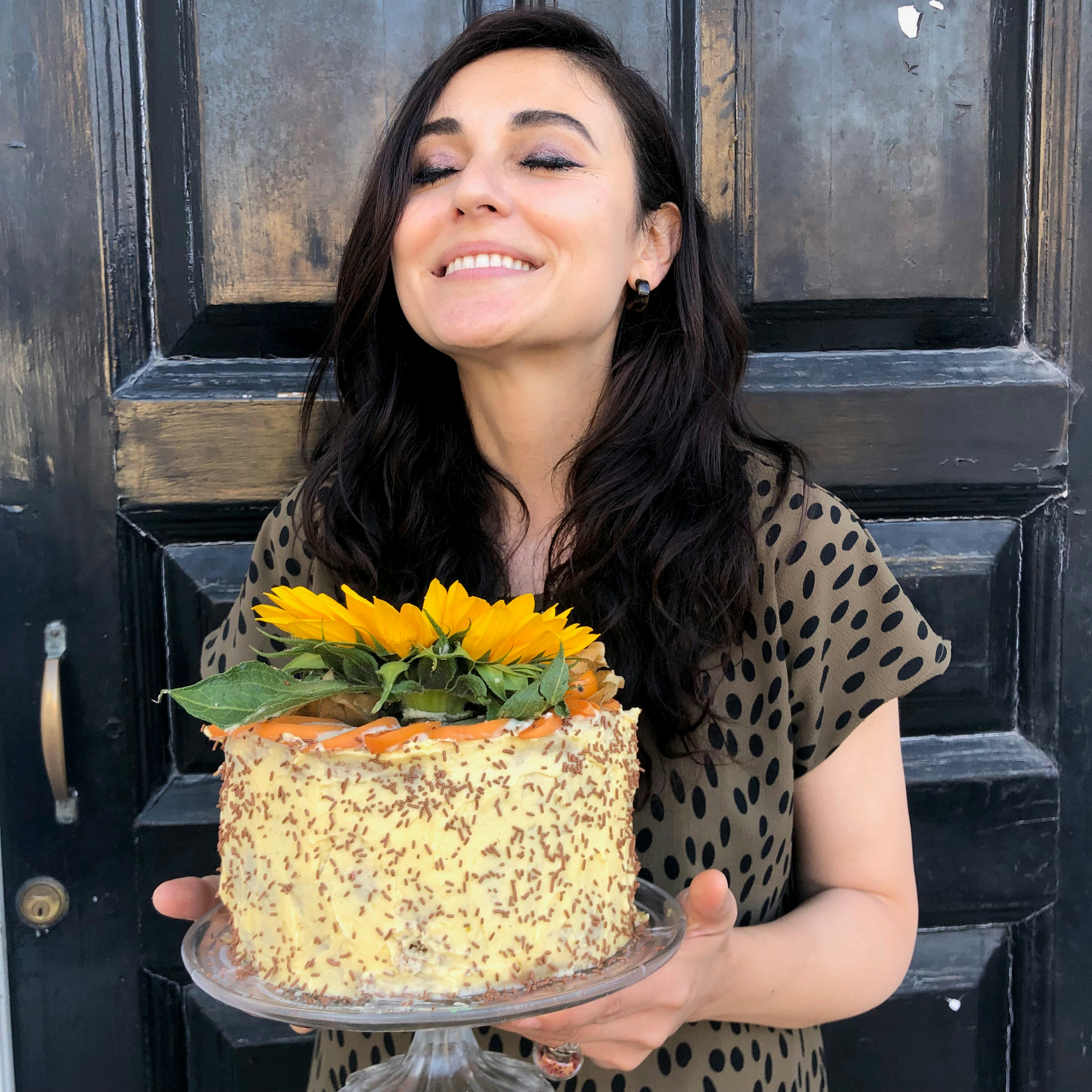 Happy student with cake