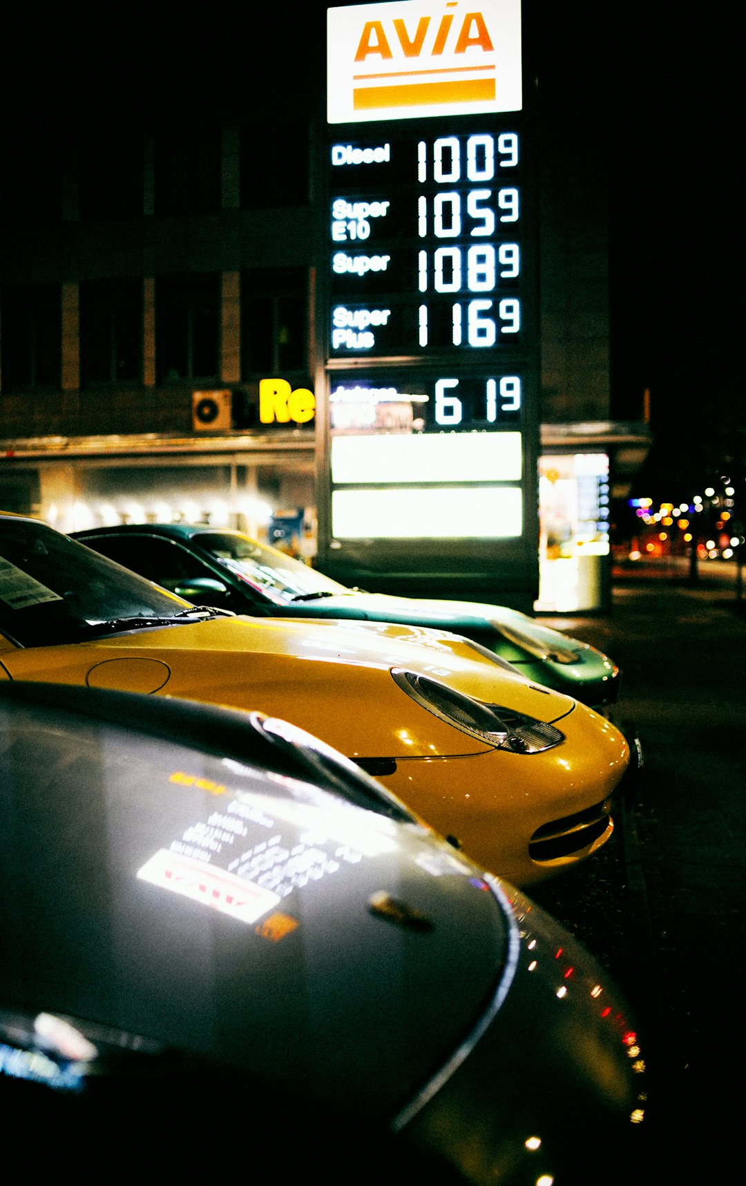 yellow ferrari car on road during night time