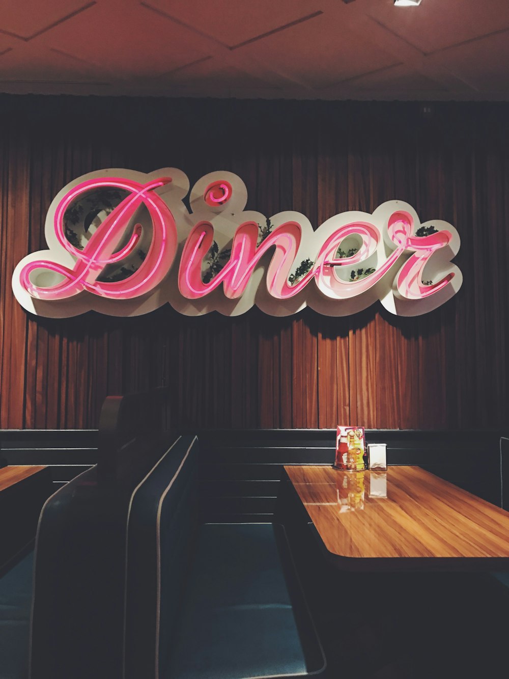 pink and white love neon light signage