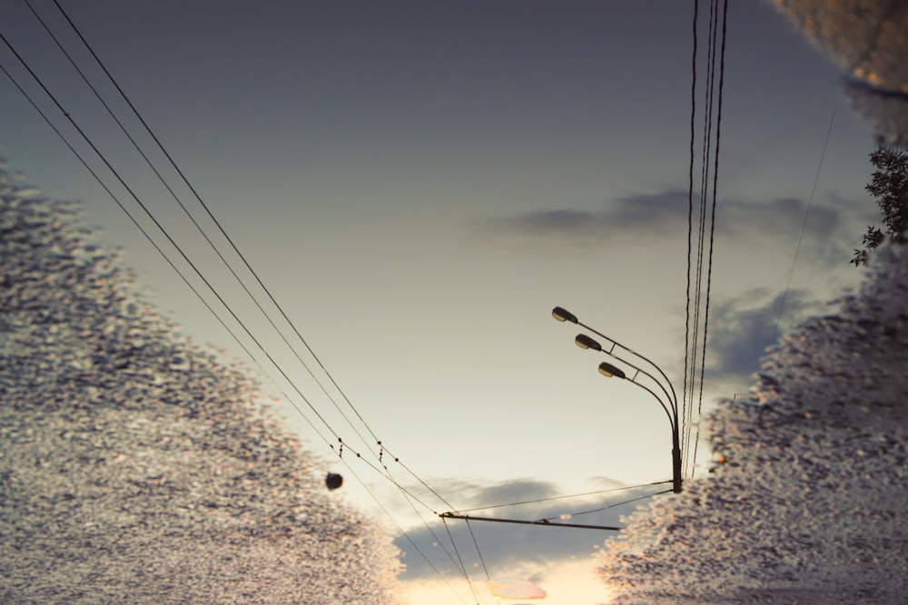 black cable cars under blue sky during daytime