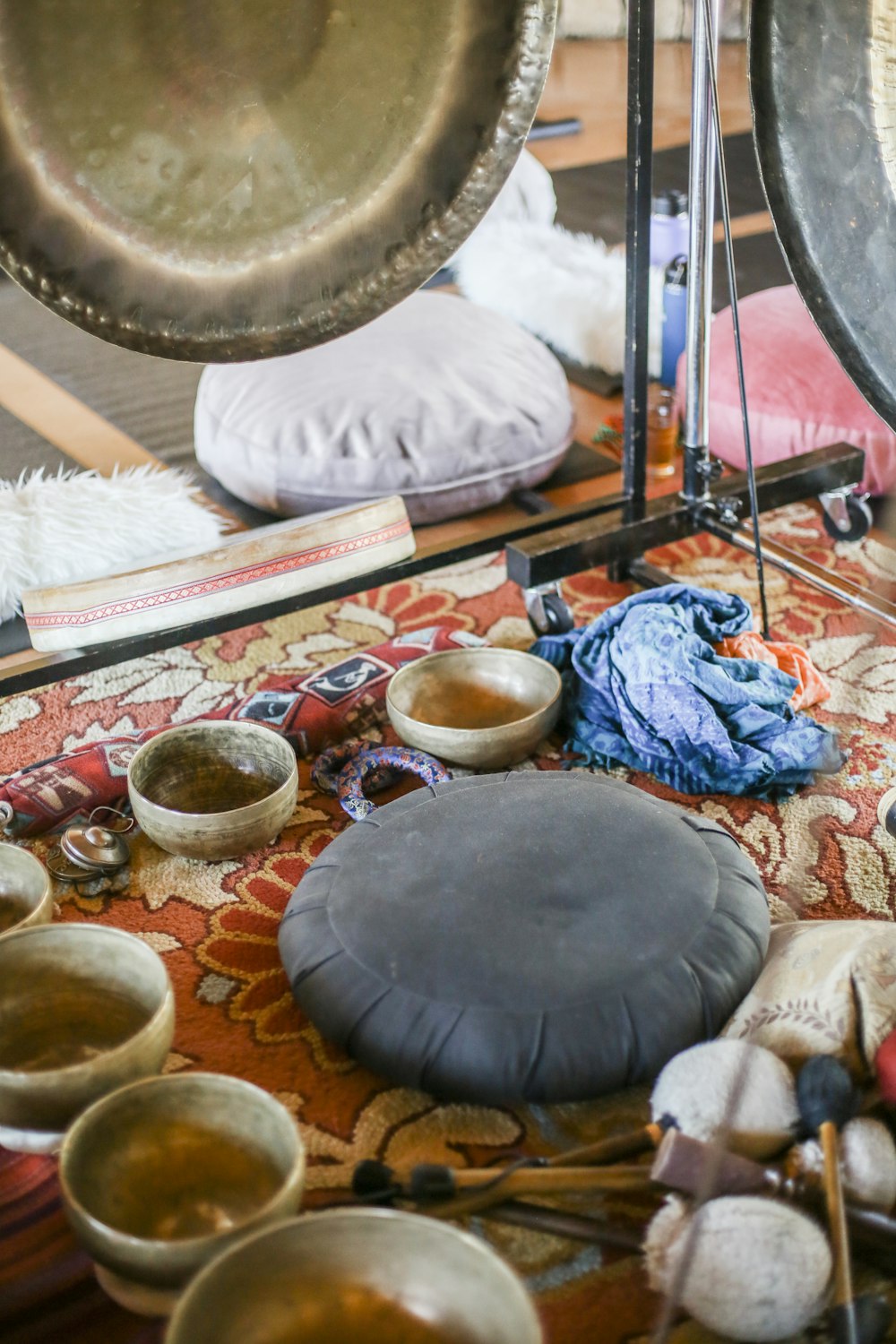 black round table with blue and white textile