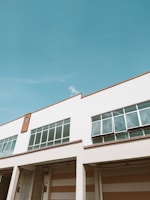 A completed industrial facility with a sleek exterior and large doors.