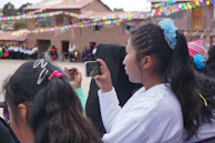 A panoramic view of a festive outdoor event with guests enjoying the celebration.