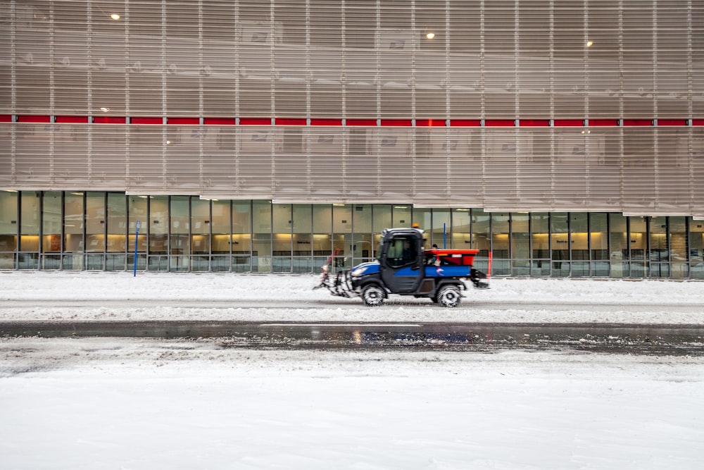 black motorcycle parked on snow covered ground