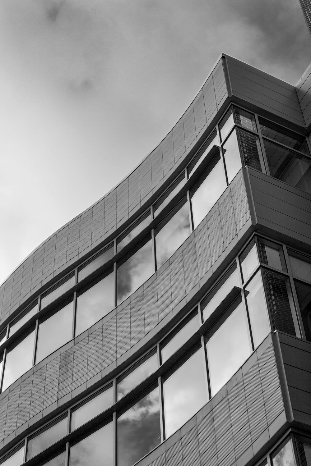 grayscale photo of concrete building