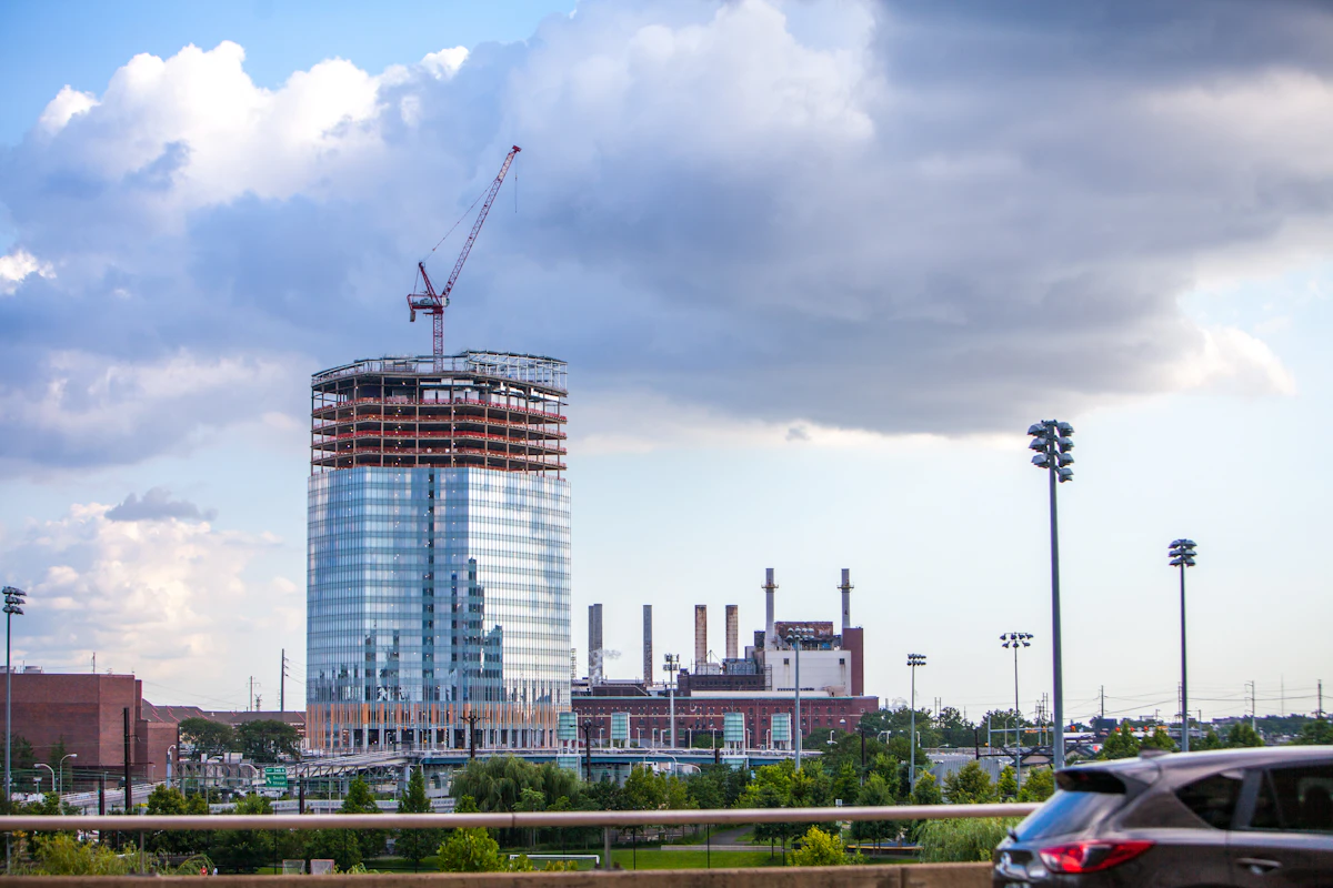 Modern healthcare facility building with landscaped grounds, representative of new hospital development