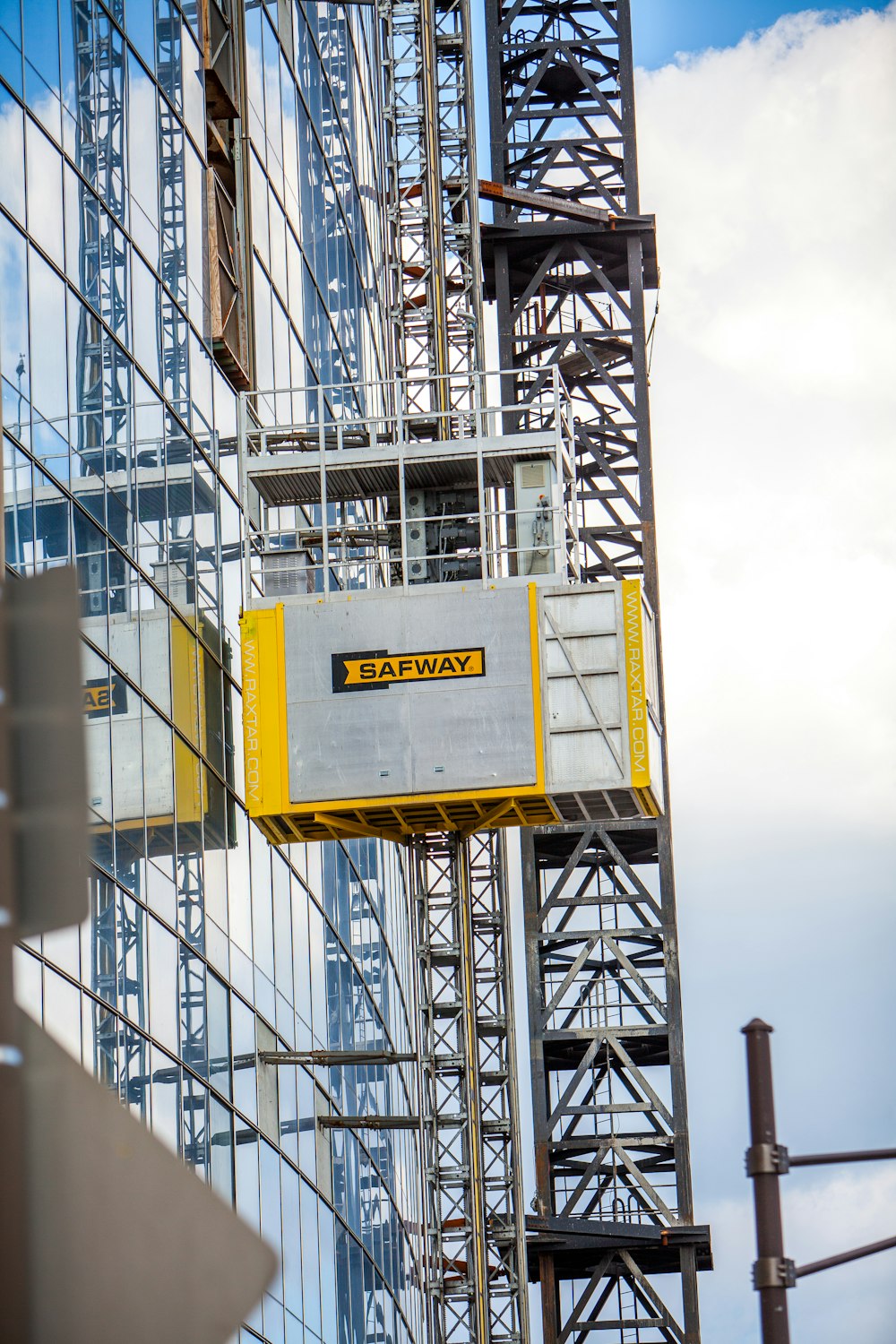 yellow and gray metal crane